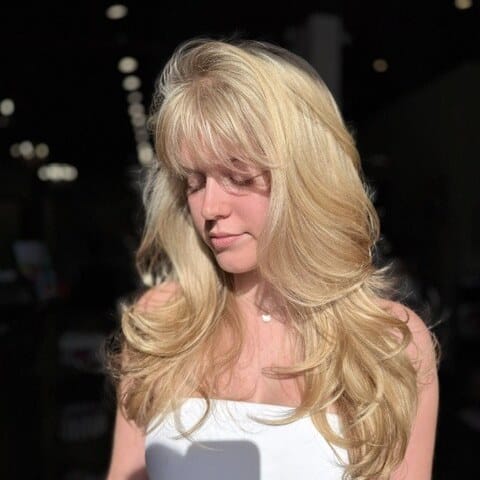 Blonde layers with curtain bangs - Salon 131 Seminole